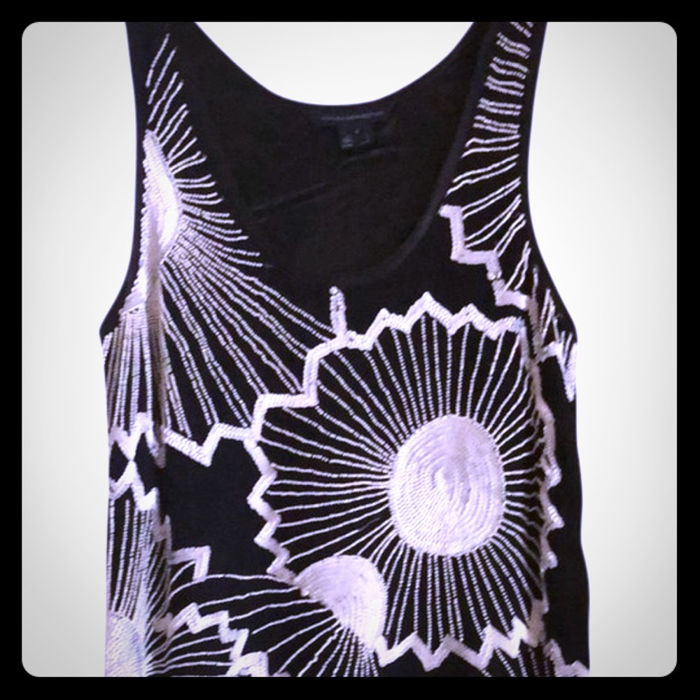 Knee-length, beaded silk dress.